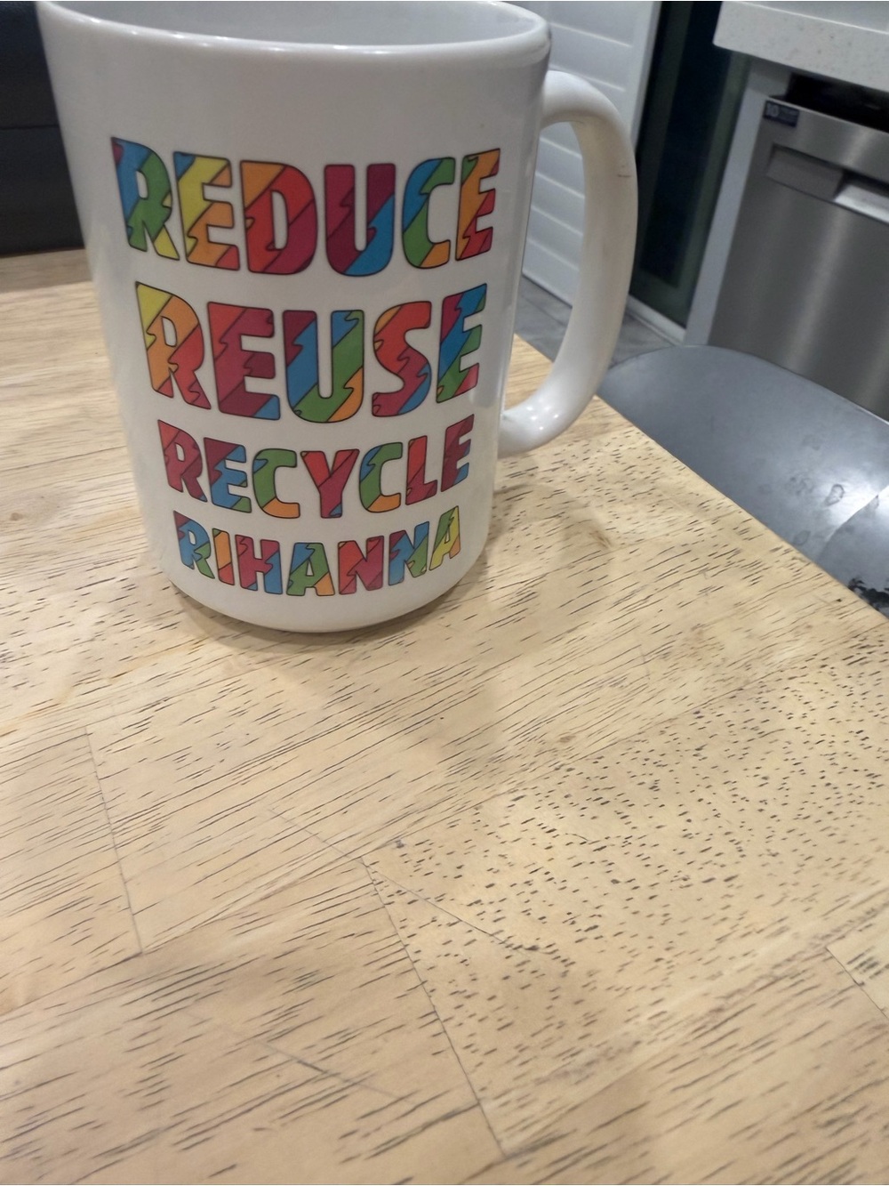 Rihanna White Ceramic 'Reduce Reuse Recycle' Rainbow Mug